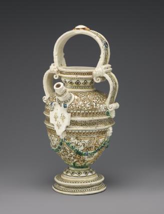 Painted porcelain ewer with spout at the center