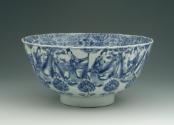 Blue and white porcelain bowl with robed figures.