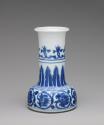 Alternate view of blue and white porcelain candle holder with geometric design