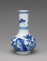 Blue and white porcelain bottle-shaped vase with vegetal decoration