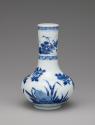 Alternate view of blue and white porcelain bottle-shaped vase with vegetal decoration