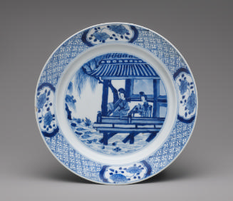 Blue and white porcelain plate with two seated figures
