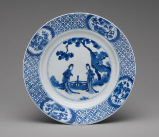Blue and white porcelain plate with two standing figures