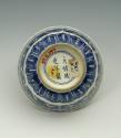 White hard-paste porcelain bowl with underglaze blue decoration bottom view