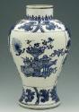 White hard-paste porcelain vase of inverted baluster shape with underglaze blue decoration