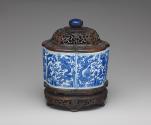 Alternate view of blue and white porcelain box with wooden lid and base