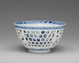 Alternate view of blue and white porcelain reticulated bowl