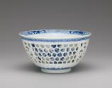 Alternate view of blue and white porcelain reticulated bowl