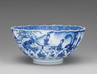 Blue and white porcelain bowl with figures in a landscape