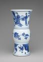 Alternate view of blue and white porcelain beaker vase depicting figures in a landscape