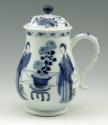 White hard-paste porcelain covered mug with handle and underglaze blue figural decoration