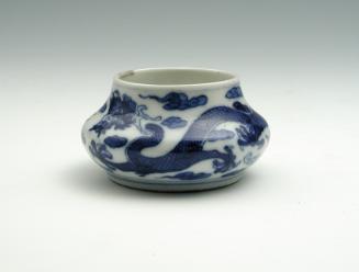 White hard-paste porcelain water receptacle with underglaze blue dragon decoration