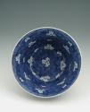 White hard-paste porcelain bowl with underglaze blue decoration, interior view