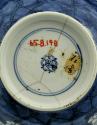 White hard-paste porcelain bowl with underglaze blue decoration, detail of bottom