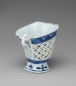 Back view of blue and white porcelain reticulated cream pot or libation cup