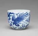 Alternate view of white hard-paste porcelain cup with plain rim and underglaze blue dragon deco…