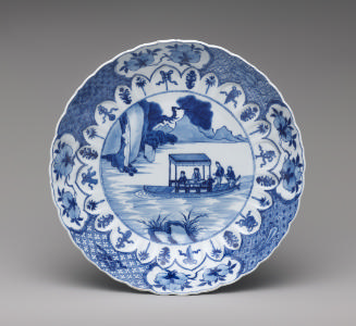White hard-paste porcelain dish with foliate rim with underglaze blue decoration