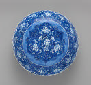 Top view of blue and white porcelain round box with dome lid