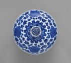 Top view of blue and white porcelain bowl with cover, floral design