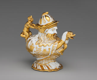 Large anthropomorphic teapot with gold