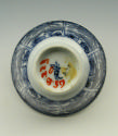 White hard-paste porcelain saucer and wine cup with underglaze blue decoration, view of saucer …