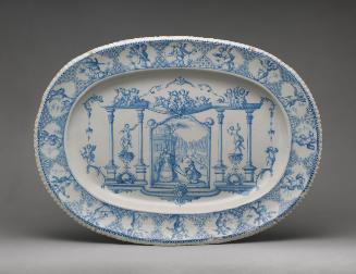 Large oval, blue and white platter with architecture and a decorative border