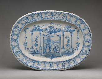 Large oval, blue and white platter with architecture and a decorative border