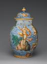 Alternate view of one of two covered vases with figures in a seascape, in color