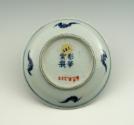 White hard-paste porcelain candlestick holder with underglaze blue decoration, bottom view