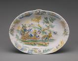 A large oval basin with a mythological scene, in color