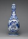 Side view of blue and white porcelain gourd shaped vase