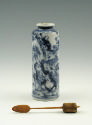 Blue and white porcelain cylindrical bottle with stopper and wand