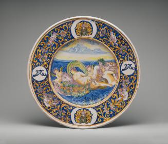 Circular plate with a mythological scene and ornate border, in color