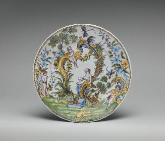 Circular plate with a rococo landscape and female figure in color