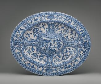 Large, oval platter covered with ornate decoration in blue and white