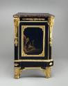 Side view of a cabinet in black and gold Japanese lacquer and ebonized wood with gilt bronze mo…