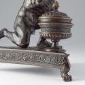 Detail of bronze sculpture of crouching Atlas supporting globe