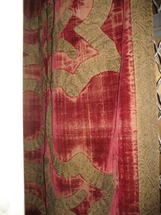 Red velvet hanging with woven design