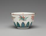 Alternate view of tea bowl with relief leaf motif and painted decoration