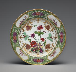 large dish with green border and floral decoration