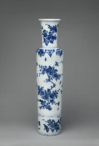 Tall vase with blue floral decoration