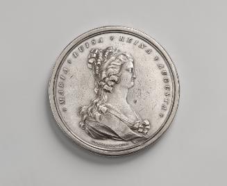 Silver medal of a woman in profile to the right, wearing a gown tied in the front with a sash