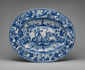 Oval platter with figurative decoration in blue and white