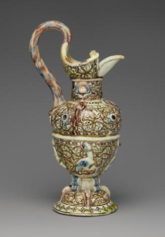 Alternate view of glazed earthenware ewer with grotesque designs and patterns