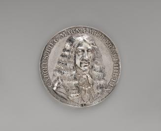 Silver portrait medal of Charles II, King of England with long hair and thin mustache, wearing …