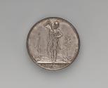 Silver medal of a nude man in contrapposto wearing a cape and helmet sheathing a long sword wit…