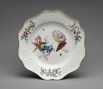 Plate with painted mushrooms and floral decoration