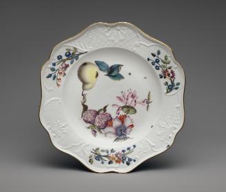Plate with painted fruit and floral decoration