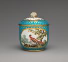 Alternate view of porcelain sugar bowl in blue and gold with an image of a bird in a tree