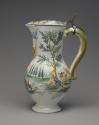 Pitcher decorated with painted landscapes, in color